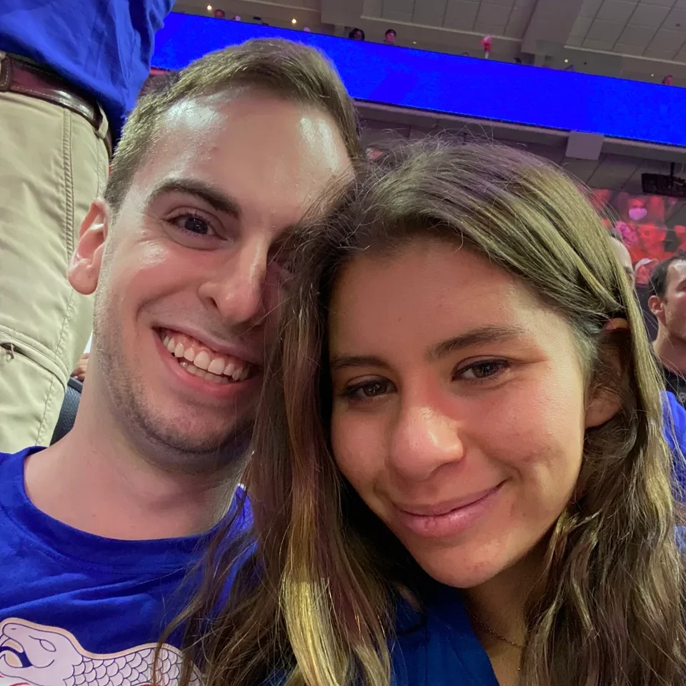 Leah and Justin at a Sixers playoff game, their first photo together.